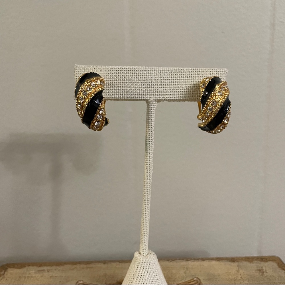 Beautiful vintage earrings. Black with gold tone and rhinestone accents.